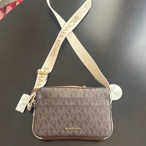 Michael Kors Signature Maeve 
EW pocket Crossbody Bag Tan and Brown